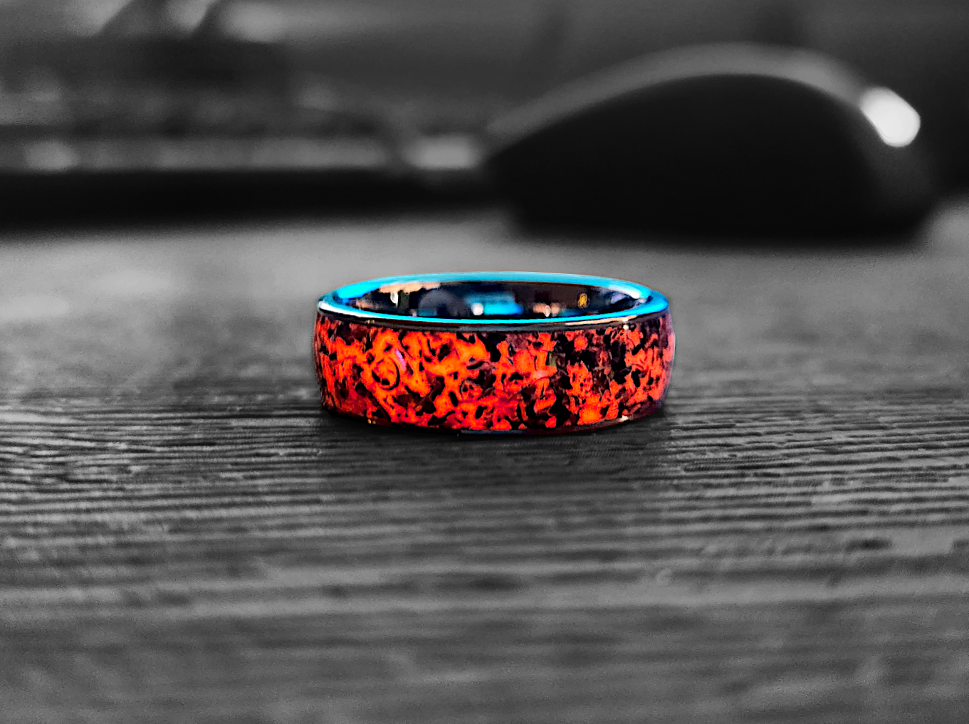 A striking ring with a bold, fiery pattern against a sleek, metallic surface, evoking the grandeur of the moon and celestial wonders. Bespoke Space, Once in A Blue Moon Ring